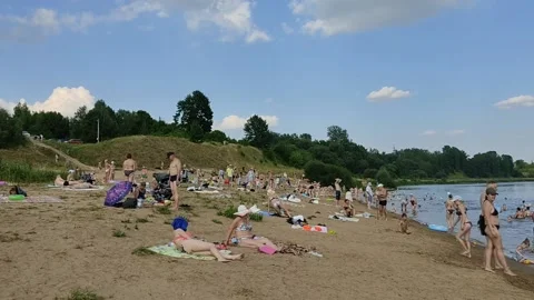 City sandy beach by the river. Rest in the open air on the day off. Stock Footage 159075167