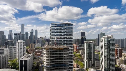 City Skyline Clouds and Construction Toronto Stock Footage 123876427