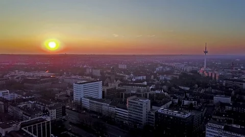 The city skyline of Essen during sunset, aerial Stock Footage