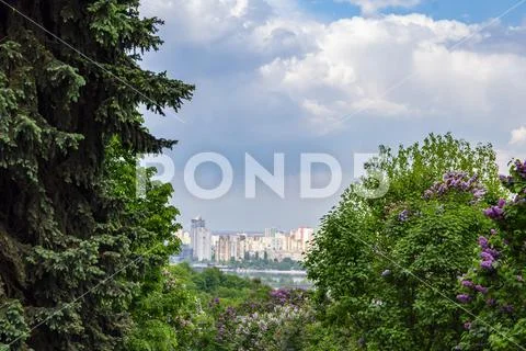 City skyline of Kiev from the height of bird flight under the clouds Stock Photos