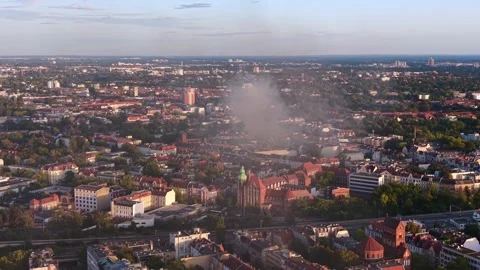 City skyline with large fire smoke plume rising. Fabulous aerial view drone Stock Footage 345336918