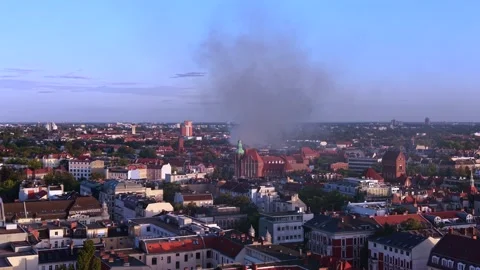 City skyline with large fire smoke plume rising. Gorgeous aerial view drone Stock Footage 345336935
