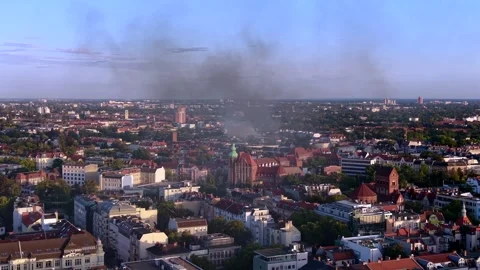 City skyline with large fire smoke plume rising. Perfect aerial view drone Stock Footage 345336980