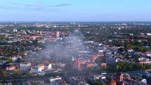 City skyline with large fire smoke plume rising. Nice aerial view drone Stock Footage 345337260