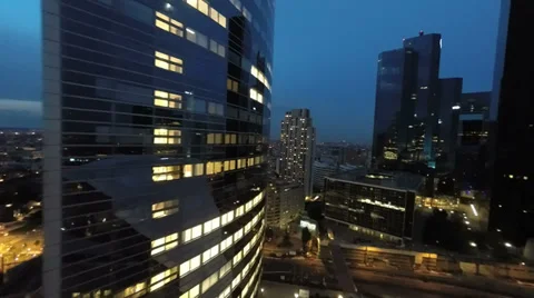 City skyline at night. aerial view. fly over. skyscrapers. towers. buildings Stock Footage