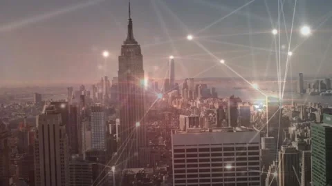 City skyline receiving glowing node network as sun flare emerges, drawing nodes Stock Footage 322120252