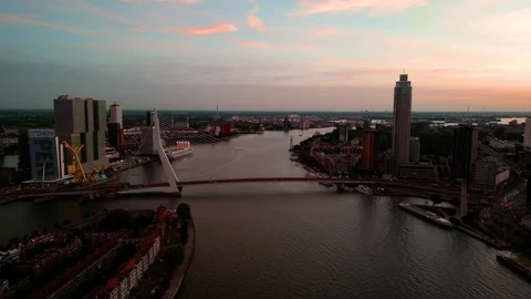 City Skyline Sunset Drone Footage | Rotterdam Erasmus Bridge Stock Footage 249677553