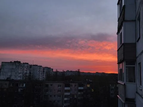 City Skyline Under Dramatic Red Sunset Stock Photos