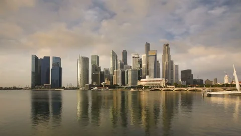 City skyline view across marina bay to the financial and business district Stock Footage