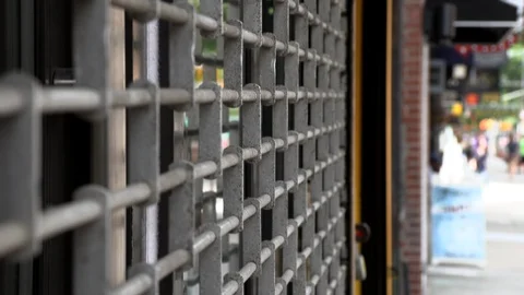 City Small Store gate closed mom an pops Video stock 119411046