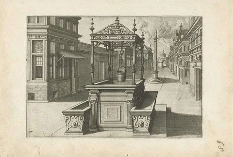 . On a city square with column, a rectangular well with iron canopy is wor... Foto stock