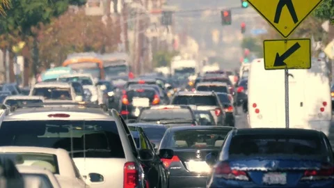 City street crowded cars in traffic jam hot day air turbulence Los Angeles Stock Footage 75249594