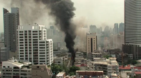 CITY STREET in Flames BURNING Riot Fire War Bombing Explosion Blast Bangkok 2010 Stock Footage