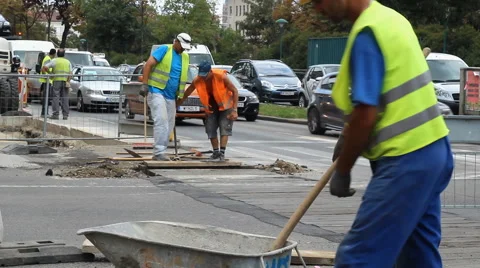 City street under construction, Construction workers, Street work Stock Footage 40698616