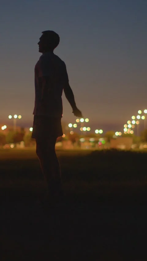 City sunset backdrop with mindful stretching and peaceful atmosphere Stock Footage 324591527