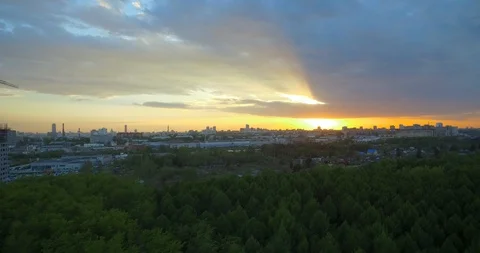 City sunset on the background of forests and construction Video stock 93298878