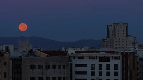 City sunset with moon going down (timelapse) Stock Footage 58729487