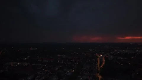 City sunset, night lightning strike summer thunderstorm. Nice aerial view drone Stock Footage 344589179