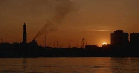 City sunset on sea Stock Footage