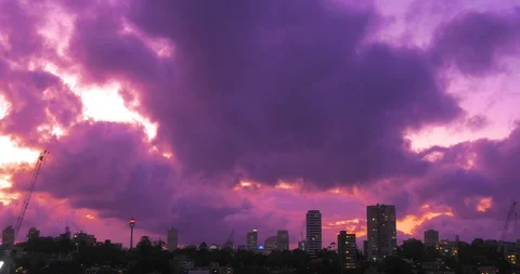 City sunset time lapse. 4K timelapse of a stunning cloudy sunset over the Stock Footage 128160905