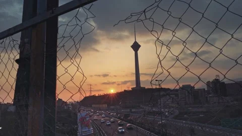 The city of Tehran with a view of the Milad tower during sunset Stock Footage 336181189