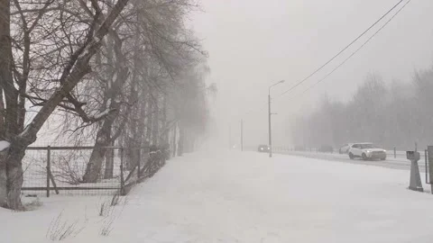 City traffic during snowfall Stock Footage 229547622