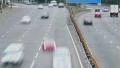 City traffic at dusk, cars drive timelapse, wide road, lights HD Footage