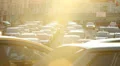 City traffic jam dusk sunlight cars stuck street, light movement HD Footage