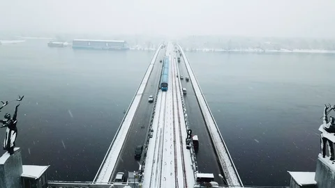 City train moving across the bridge on winter. City train moving across the Stock Footage 89487376