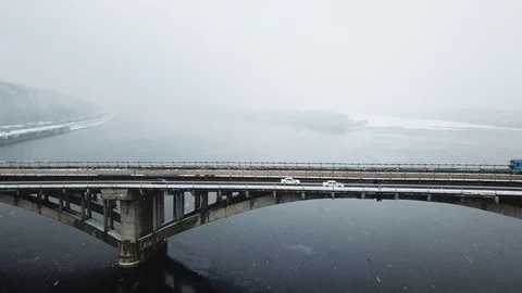 City train moving across the bridge on winter. City train moving across the Stock Footage 89487807