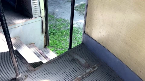 The city tram stops, the door opens and closes, view from the inside. Tram door Stock Footage 195950673
