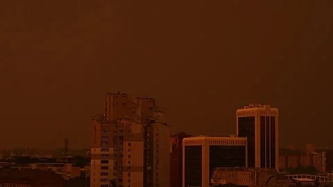 A city under an apocalyptic red storm sky and lightning Video stock 337996015