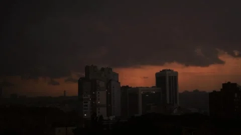 A city under an apocalyptic red storm sky and lightning Video stock 337996038