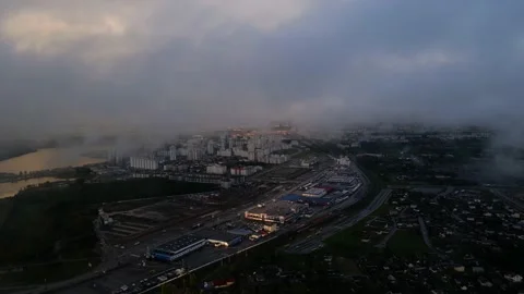 City under clouds, clouds at sunset, drone shooting in clouds, cloudy weather Stock Footage 205704694