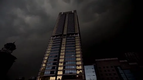 City under dark clouds Stock Footage 235131896