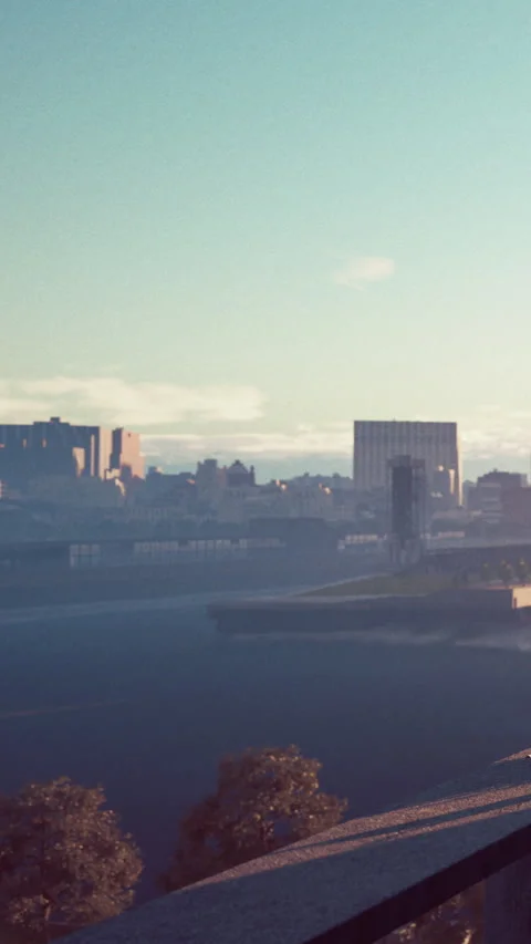 City view from a high point showing buildings, water, and sky in daylight Stock Footage 342181681