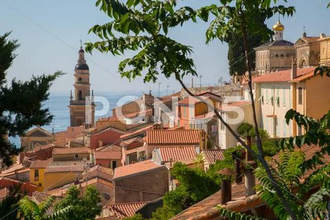 City view of medieval Menton and Basilique Saint Michel, Alpes-Maritimes, Cote Stock Photos