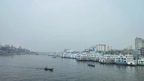 City view from middle of the river. Small boats running in the river. Stock Footage 241103514