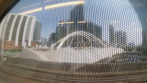 The city view out of the window of a moving train Stock Footage 332543560