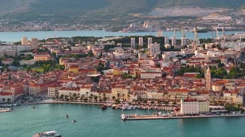 City view of Split with buildings and waterfront activities 스톡 동영상 338066640