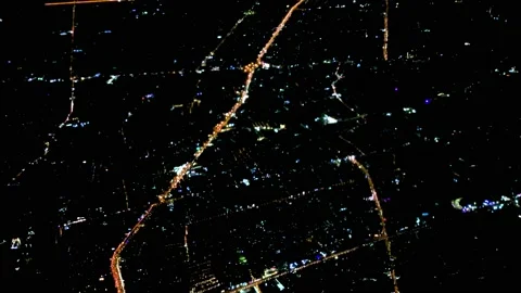 The city is visible at night from Airplane window, view from the outside, the Stock Footage 235280977