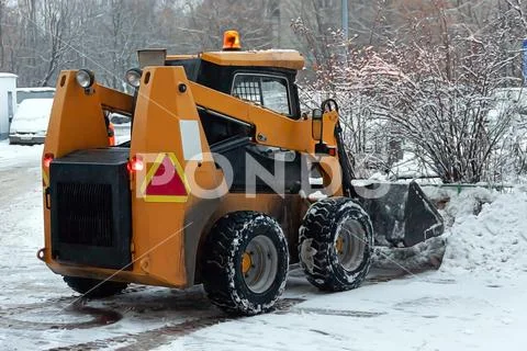 In the city of winter. Snow. All forces are thrown on snow removal. Special s Stock Photos