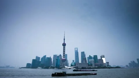 Cityscape and cloudscape in modern city shanghai at riverside, timelapse Video stock 22149244