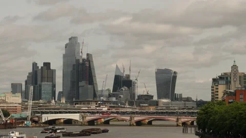 Cityscape of bridge over Thames river and skyscrapers. London, England. Stock Footage 202043101