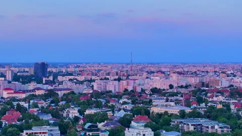 Cityscape of Bucharest, Aerial view over Bucharest City center skyline at dusk. Stock-Footage 246186663
