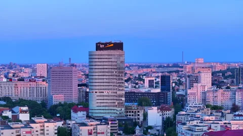Cityscape of Bucharest, Aerial view over Bucharest City center skyline at dusk. 스톡 동영상 246186749