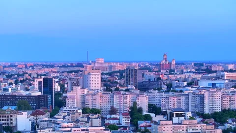 Cityscape of Bucharest, Aerial view over Bucharest City center skyline at dusk. Stock Footage 246186784