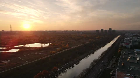 Cityscape of Bucharest at sunset, lakes in a park and residential buildings, Stock Footage 145170695