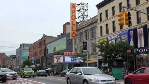 Cityscape of Central Harlem with Apollo Theater. NYC, New York, USA. Stock Footage