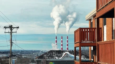 Cityscape with chimneys of a coal-fired power plant on the horizon Stock Footage 234647495